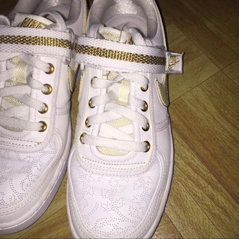 White & gold Nike sneakers